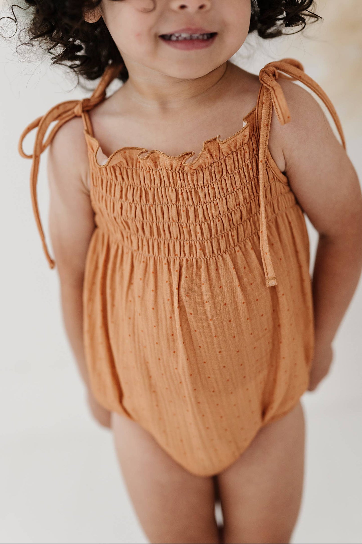 Tie Smocked Bodysuit in Dots in Toffee